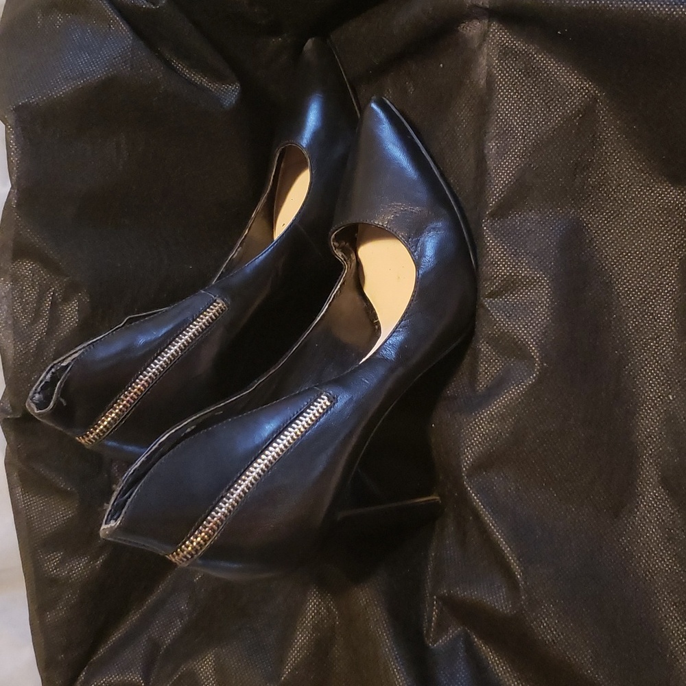 Black 4 inch heels with gold zipper